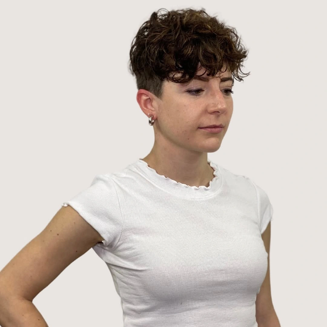 fall short haircuts 2026 Textured Curly Crop With Clean Tapered Sides