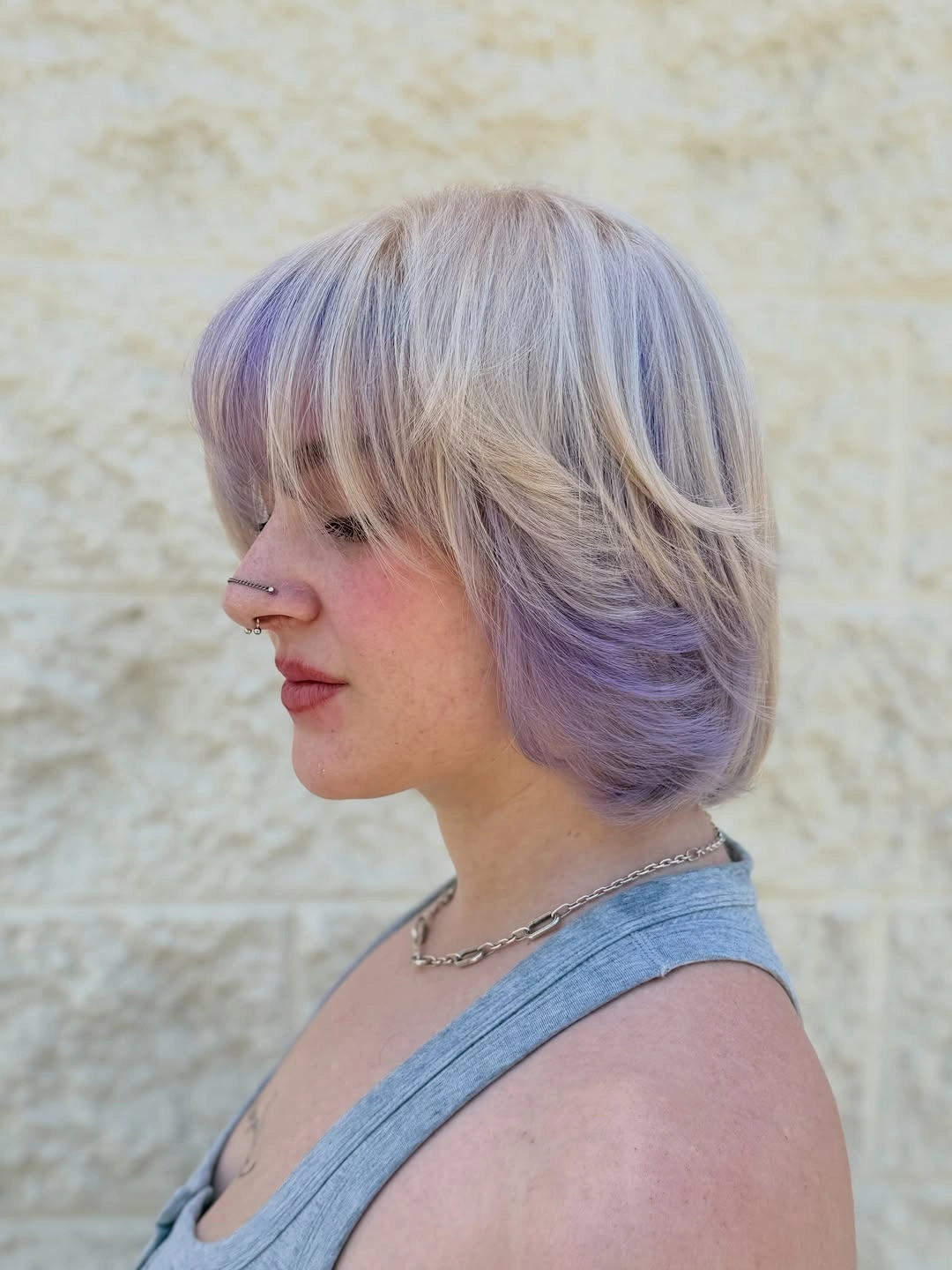 fall short haircuts 2026 Soft Lavender Layered Bob With Curtain Bangs