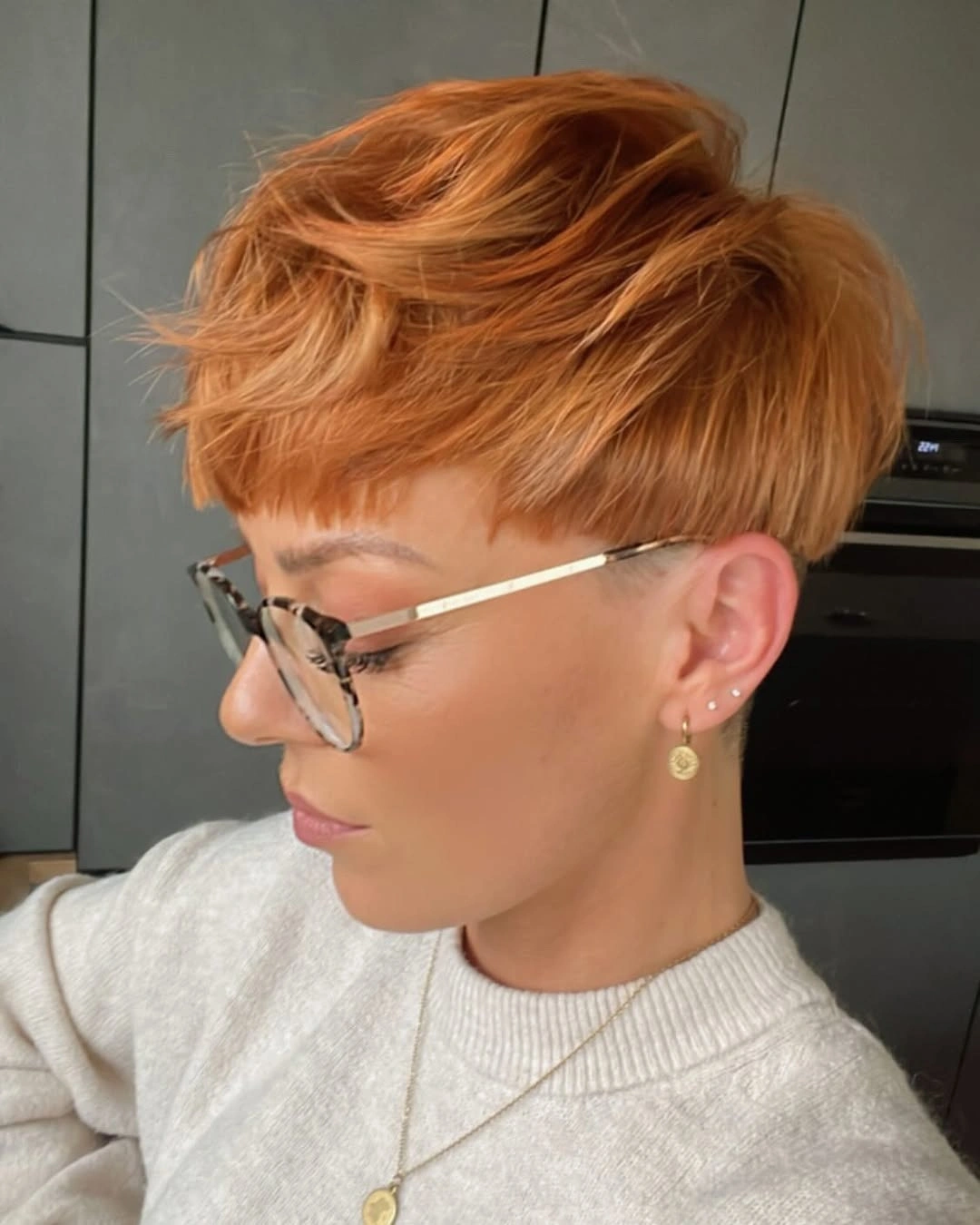 fall short haircuts 2026 Golden Crop With Graphic Micro Bangs