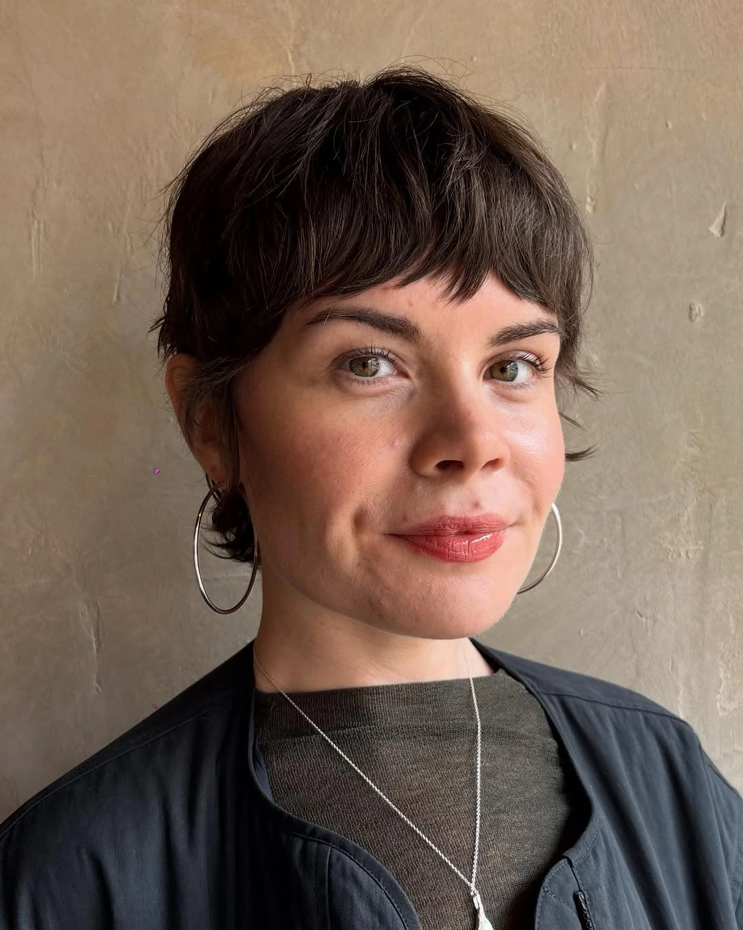 fall short haircuts 2026 Soft French Pixie With Airy Feathered Fringe