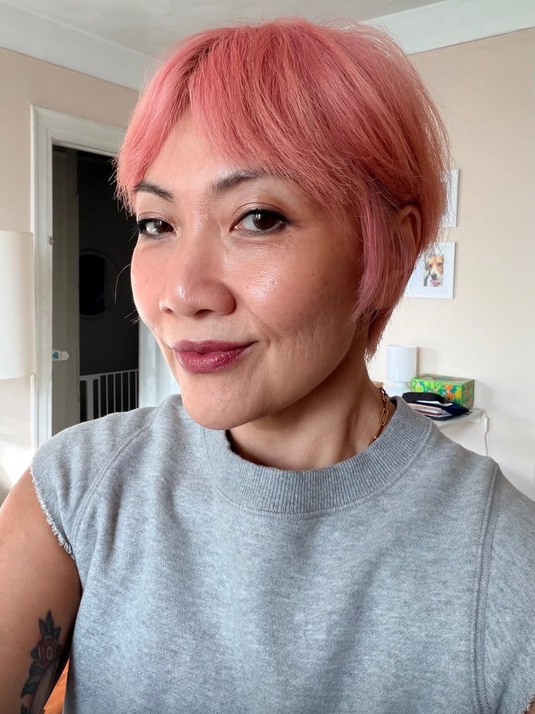fall short haircuts 2026 Blush Pink Precision Crop With Soft Baby Bangs