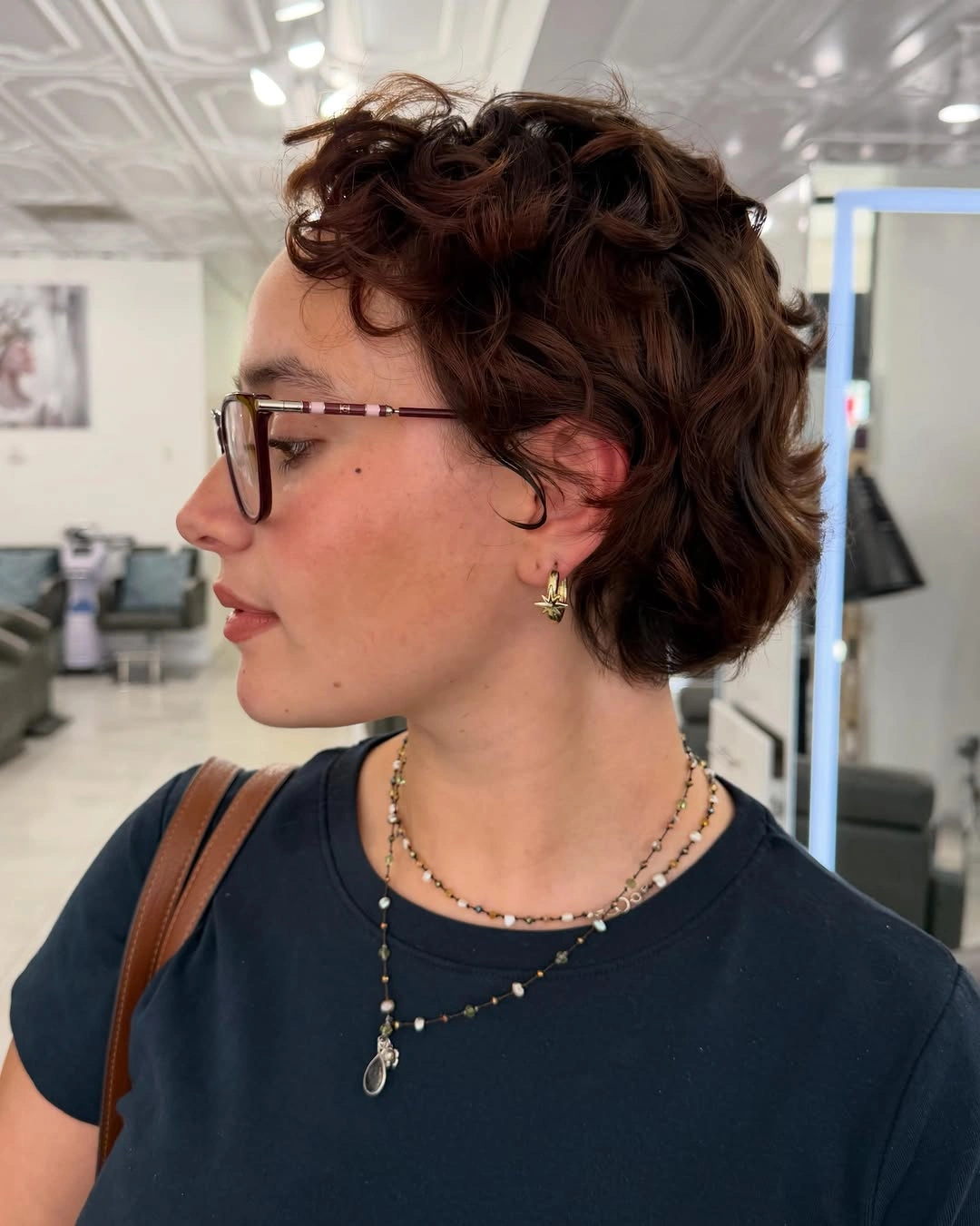 fall short haircuts 2026 Curly Pixie Shag With Soft Vintage Texture