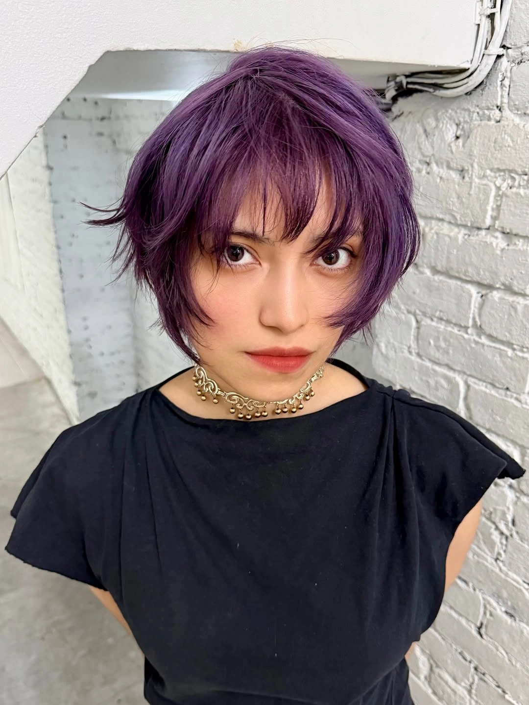 fall short haircuts 2026 Violet Layered Crop With Floating Face-Framing Pieces