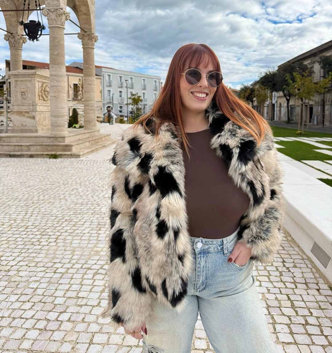 faux fur jacket Patchy White Jacket With Brown Top And Denim