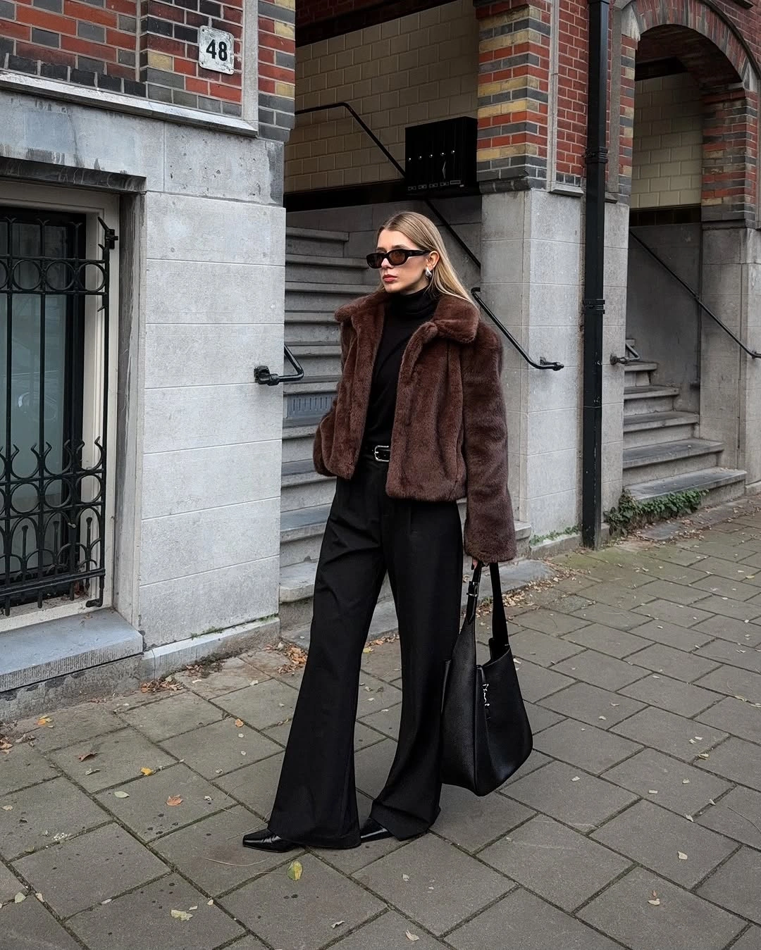 faux fur jacket Brown Jacket With Wide Black Trousers