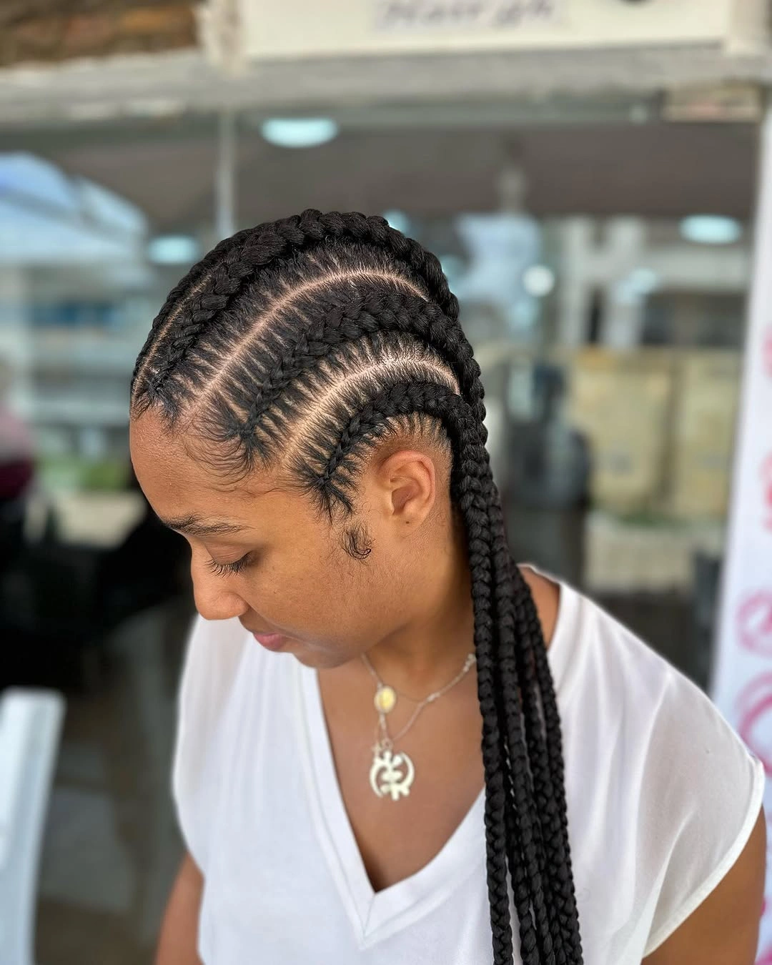 feed in braid hairstyles Bold Curved Feed-In Braids With Sculpted Sections