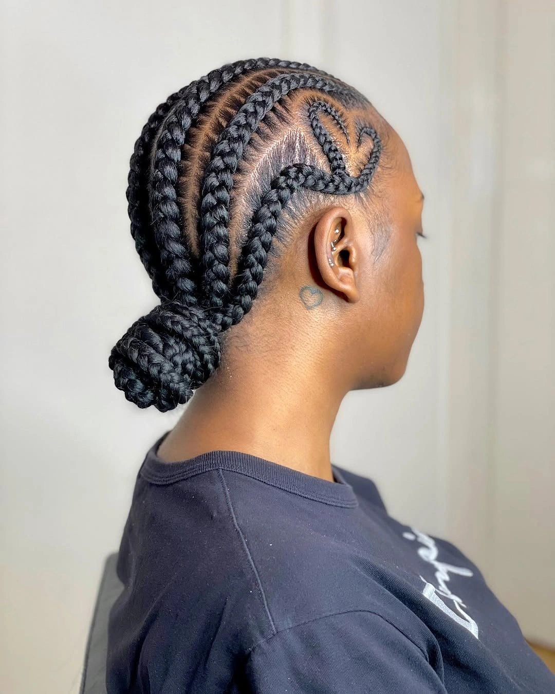feed in braid hairstyles Elegant Low Braided Bun With Heart Detail