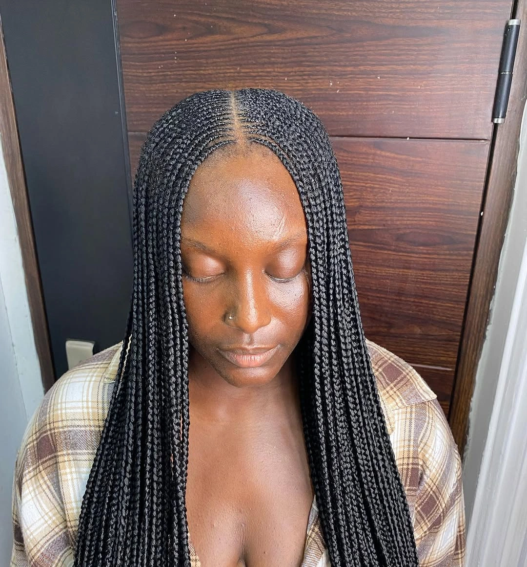 feed in braid hairstyles Micro Feed-In Braids With Sleek Middle Part