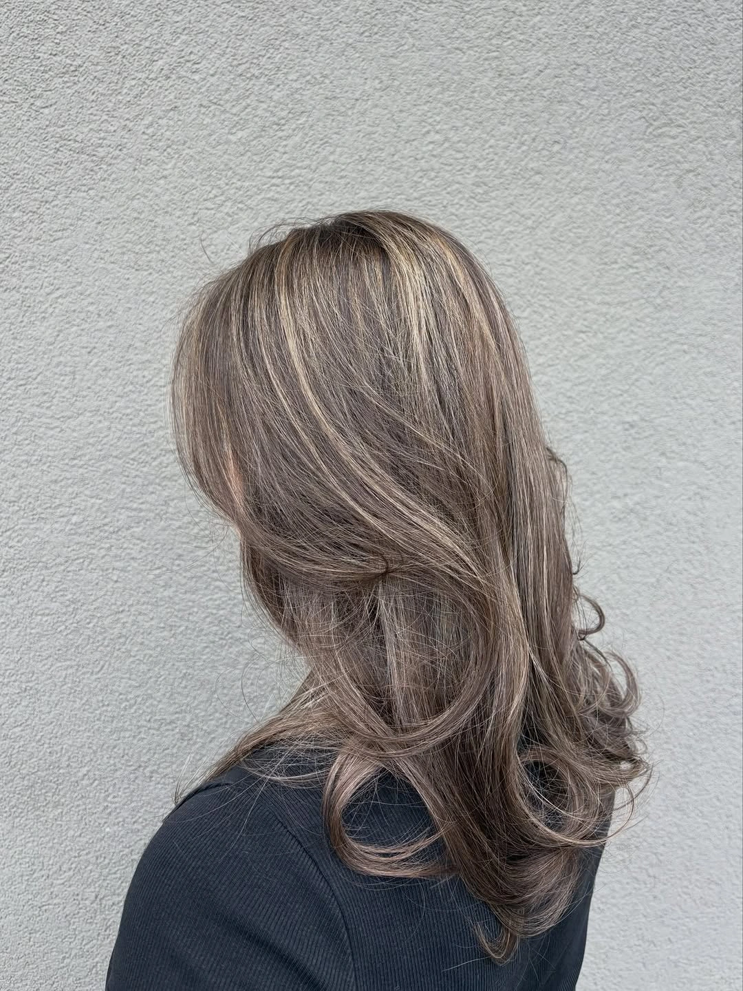 full head babylights blonde on brown hair Feathered Layers With Cool Mushroom Blonde Dimension