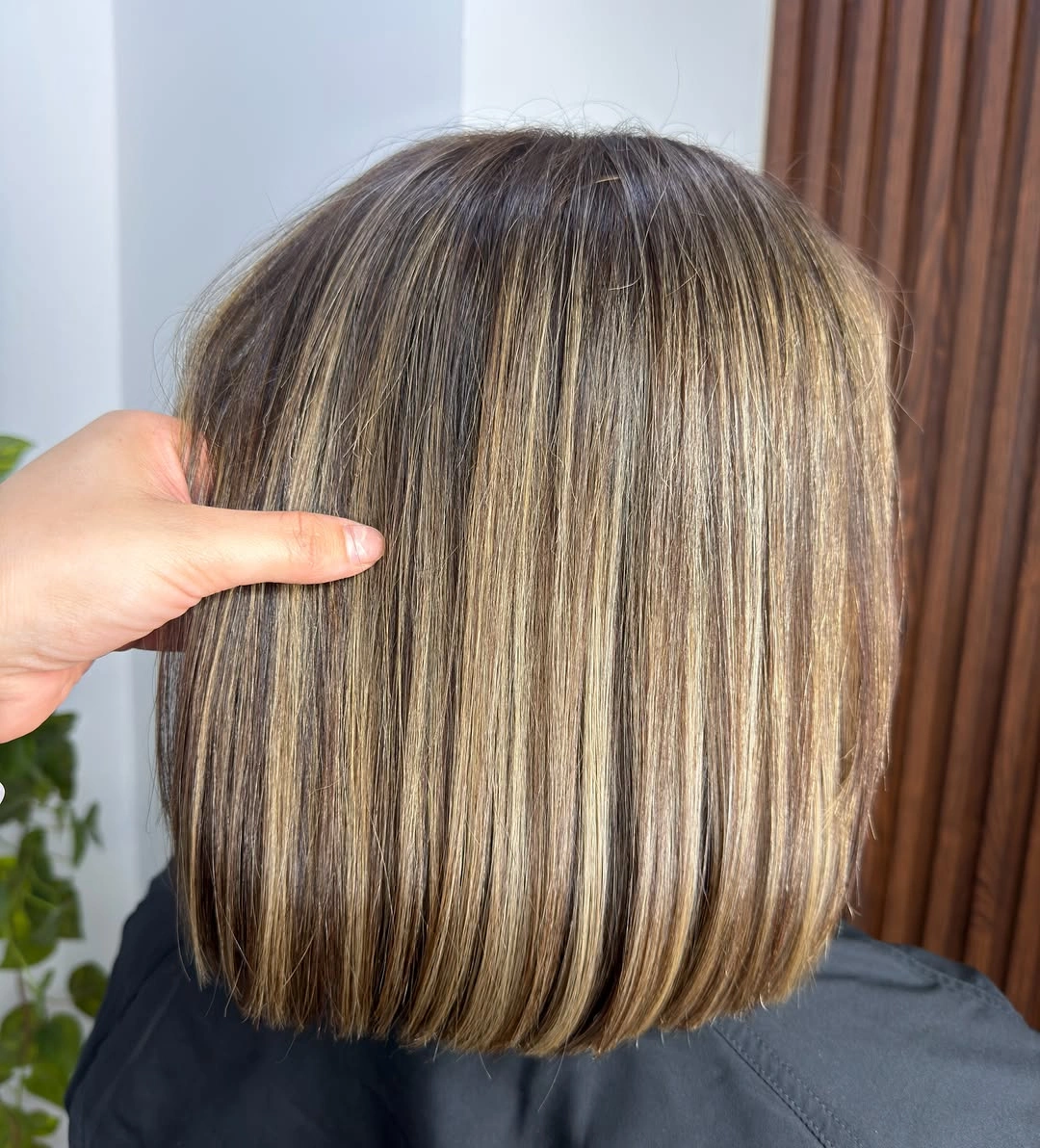 full head babylights blonde on brown hair Glossy Precision Bob With Fine Ash Babylights