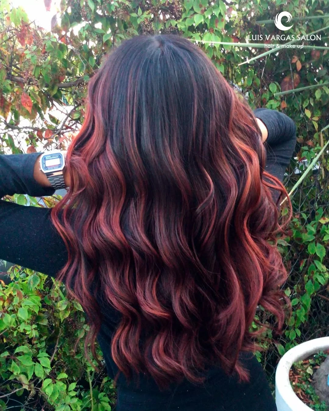 hair lowlights color ideas and inspiration Dark Red Waves With Vivid Ribbon Color
