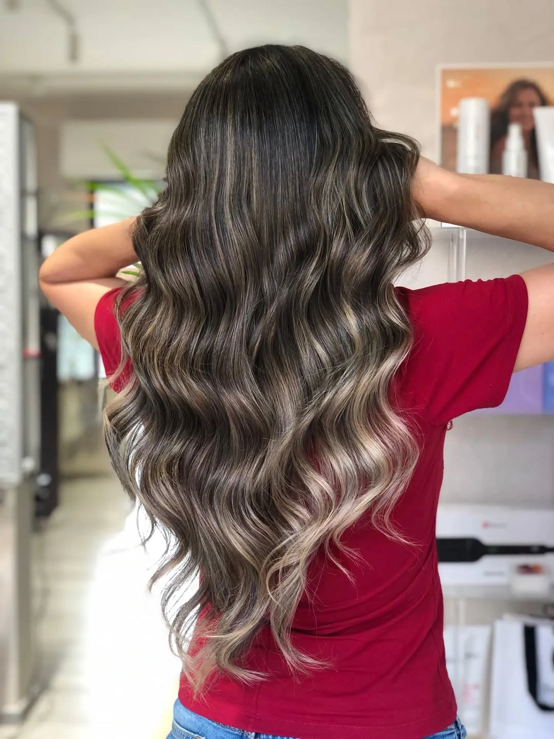 hair lowlights color ideas and inspiration Long Brunette Waves With Blonde Contrast