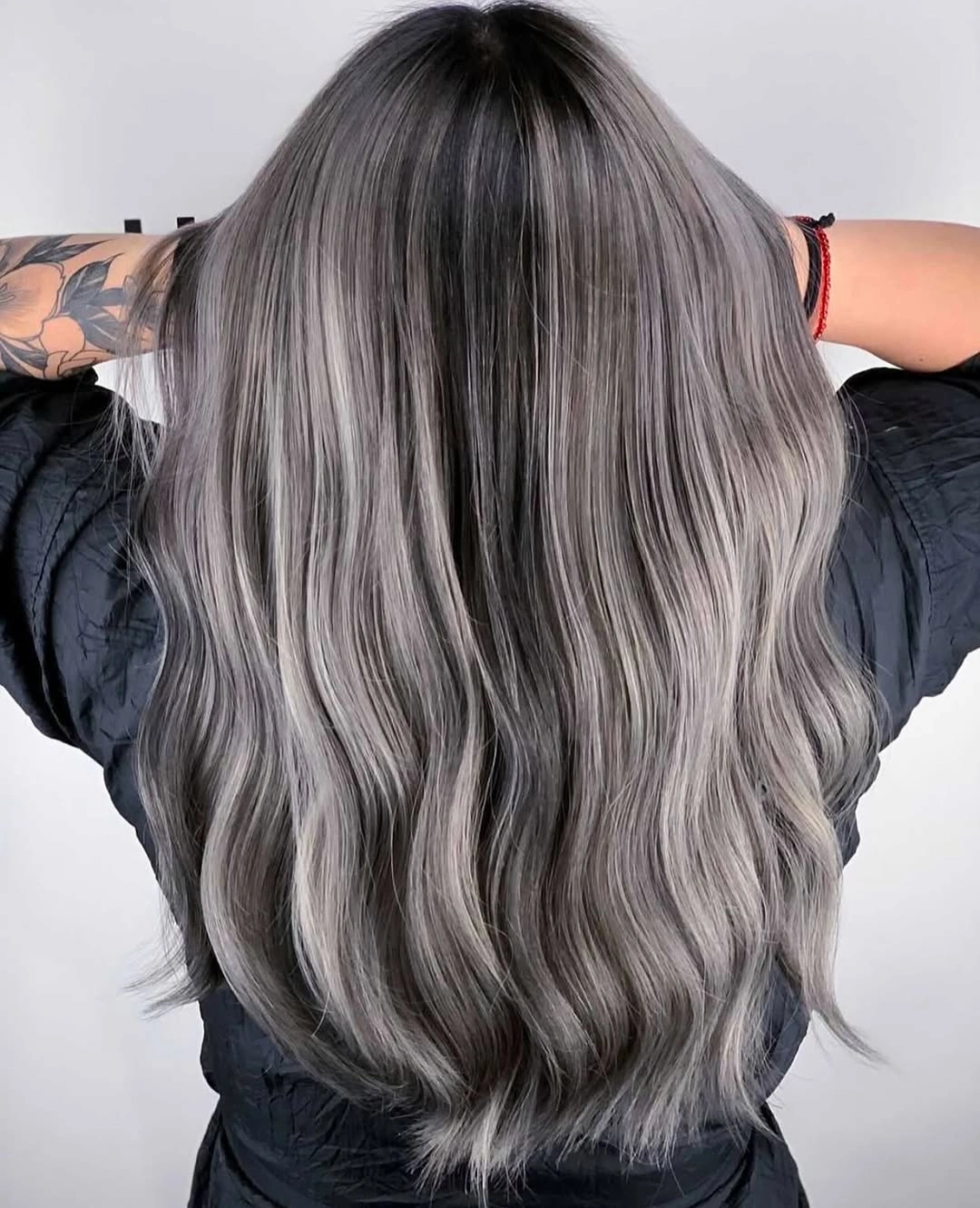 hair lowlights color ideas and inspiration Silver Brown Waves With Dark Lowlights