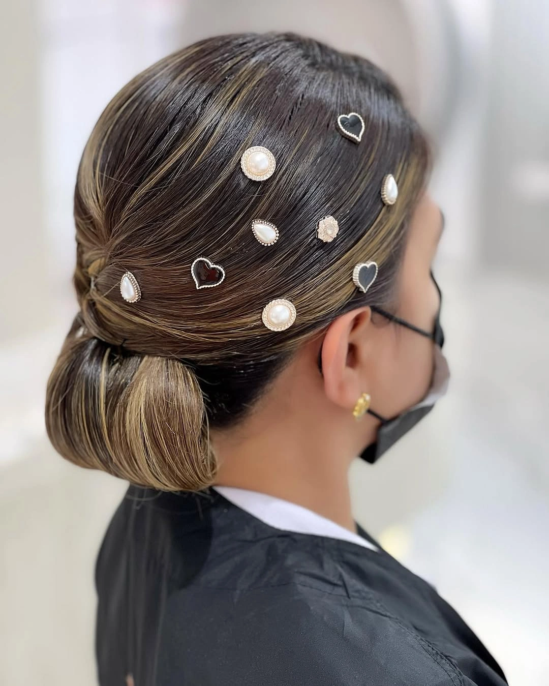 hair lowlights color ideas and inspiration Low Bun With Blonde Underside And Dark Crown