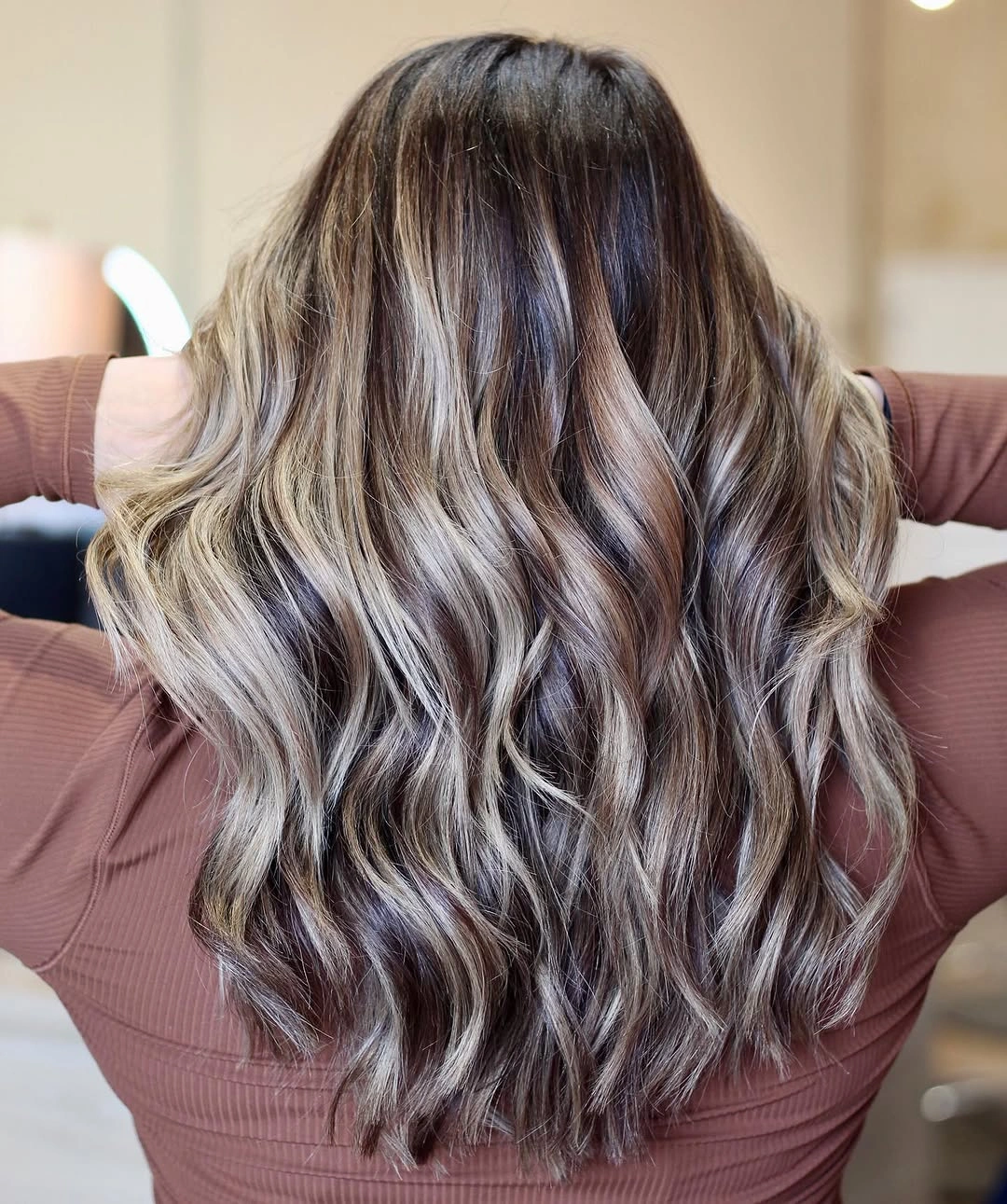 hair lowlights color ideas and inspiration Brunette Waves With Blonde And Brown Ribbons