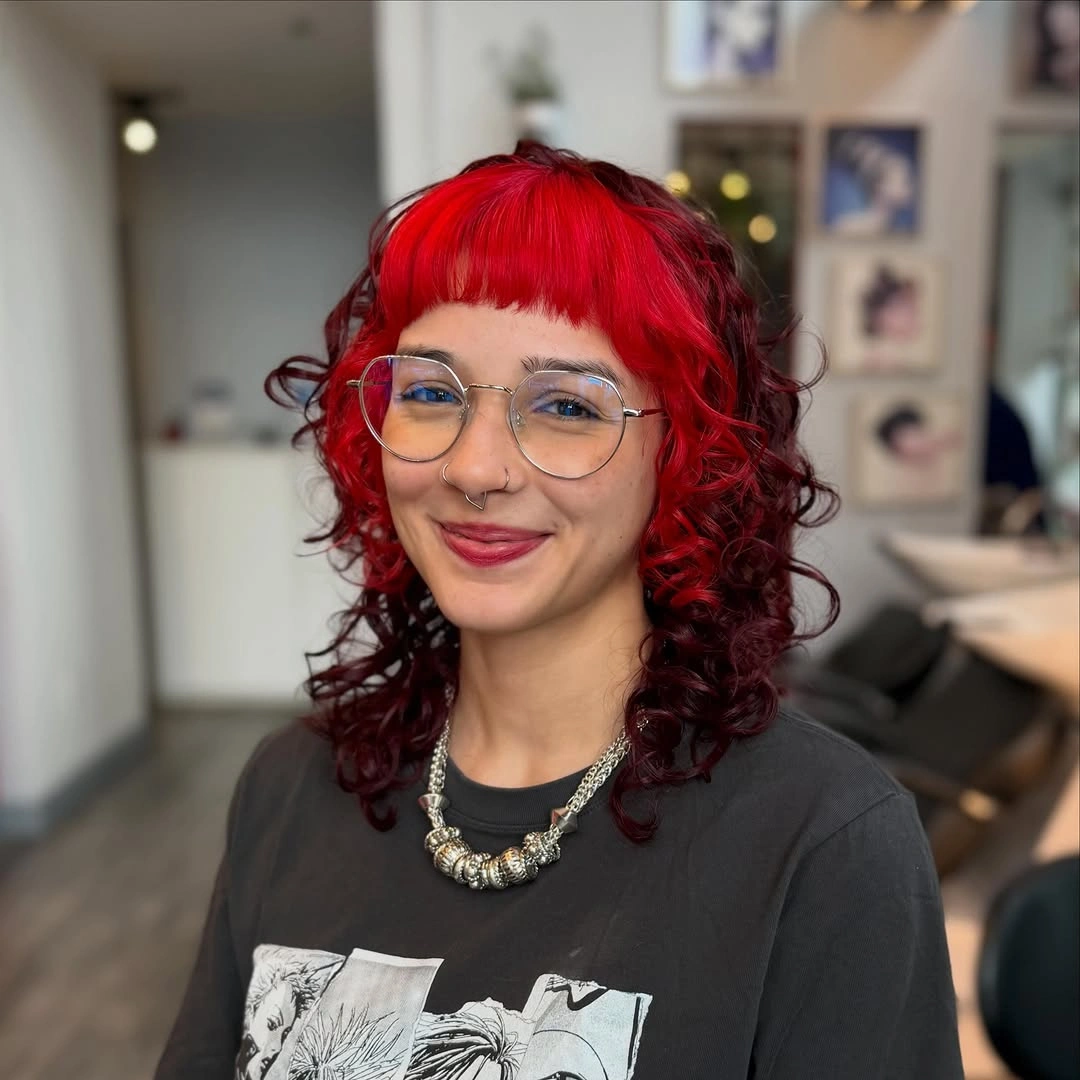 heatless curls hairstyle Cherry Red Curly Bob With Graphic Bangs for Creative Style