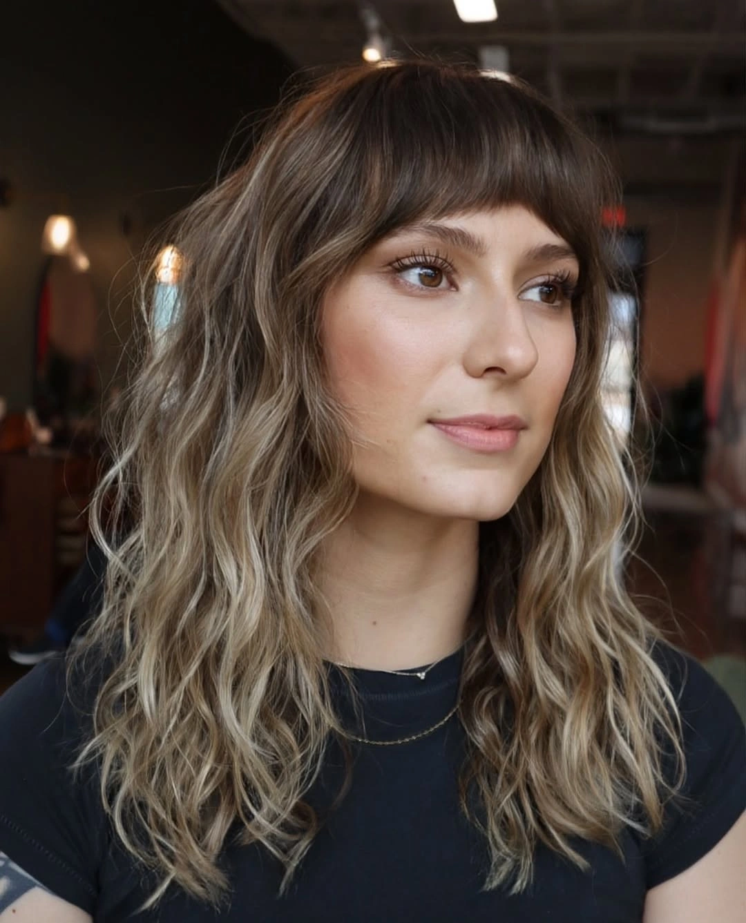 heatless curls hairstyle Soft Beach Waves With Full Bangs for Everyday Effortless Texture