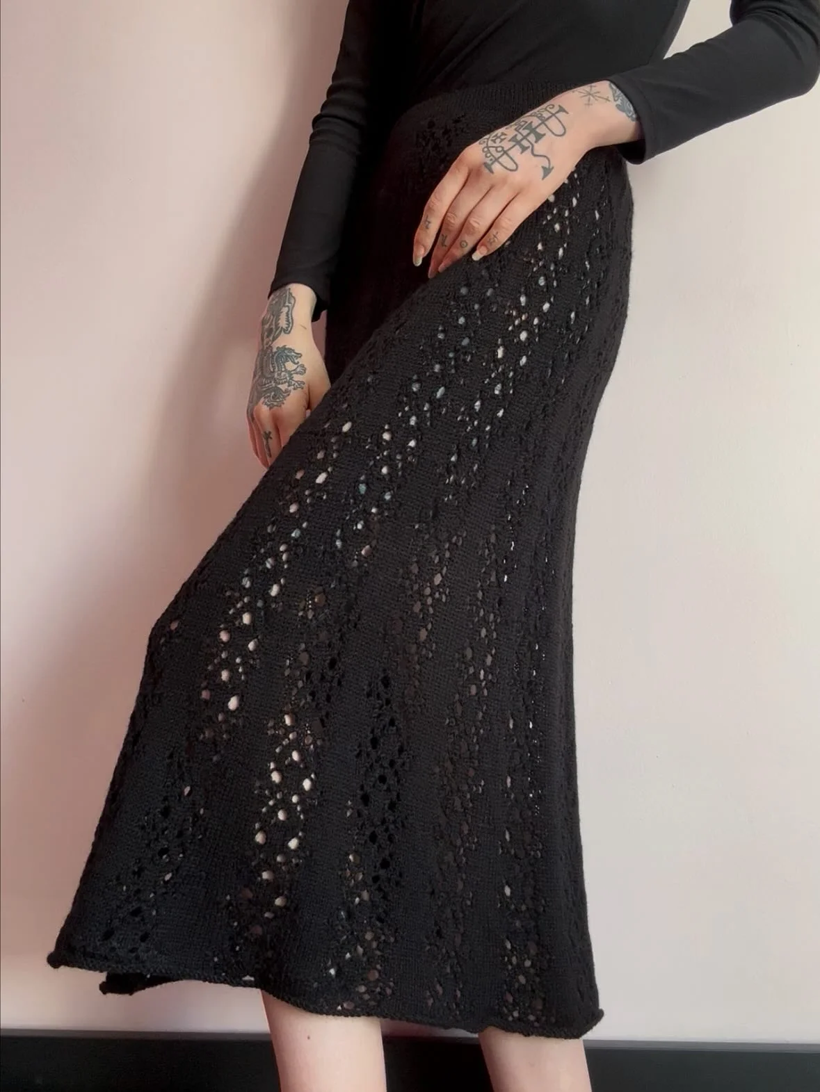 knit skirt outfits fall 2026 Elegant Black Openwork Knits for Modern Minimalists