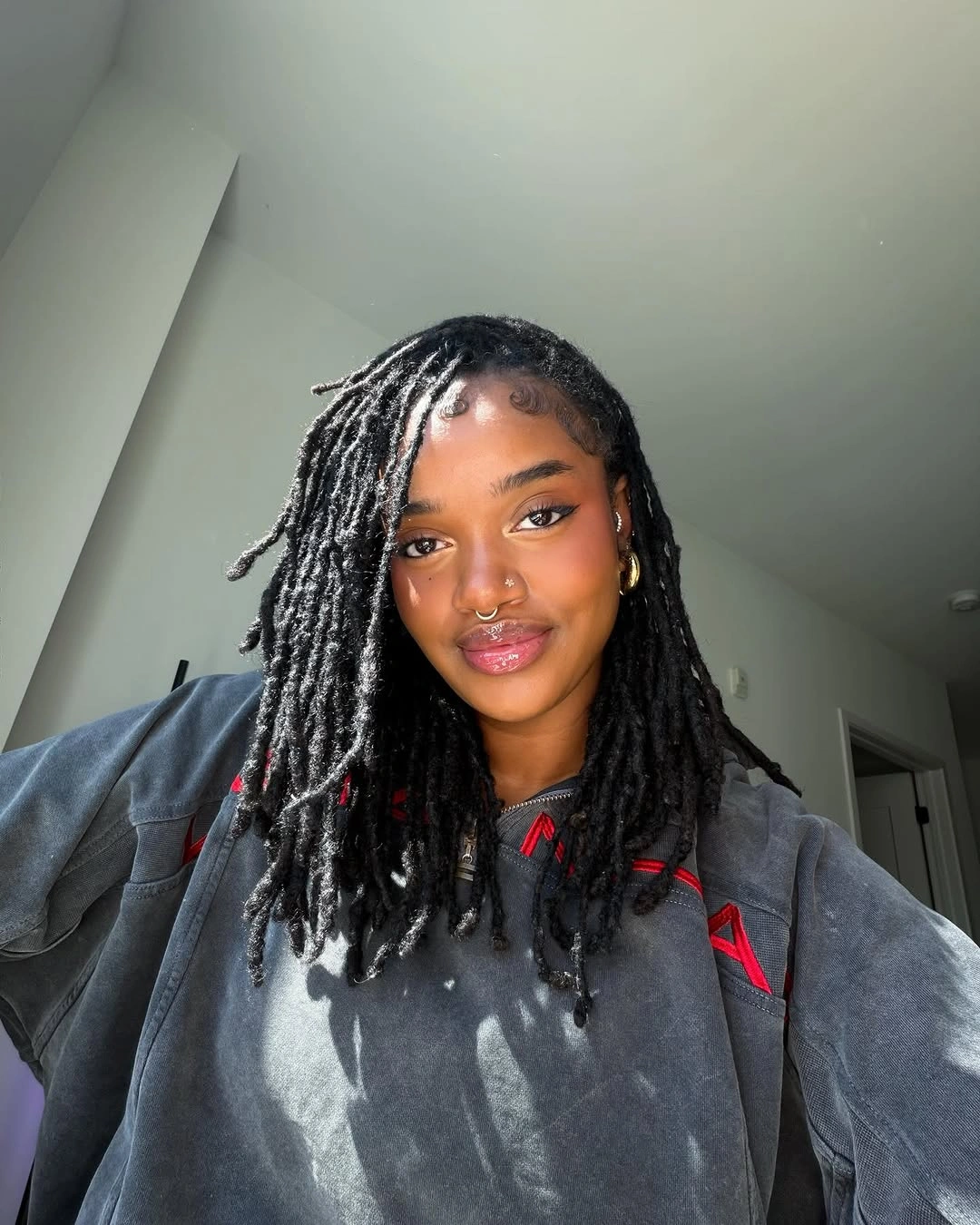 locs hairstyles for black women Classic Side-Part Locs That Never Go Out of Style