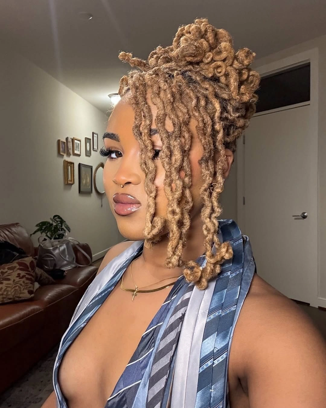 locs hairstyles for black women Soft Blonde Loc Updo With Romantic Face-Framing Pieces