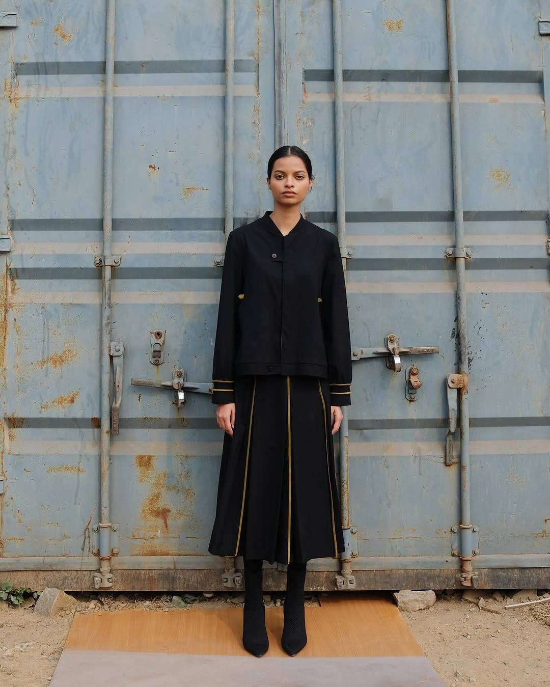 midi skirt fall outfit 2026 Elegant Black Pleated Midi for Modern Minimalists