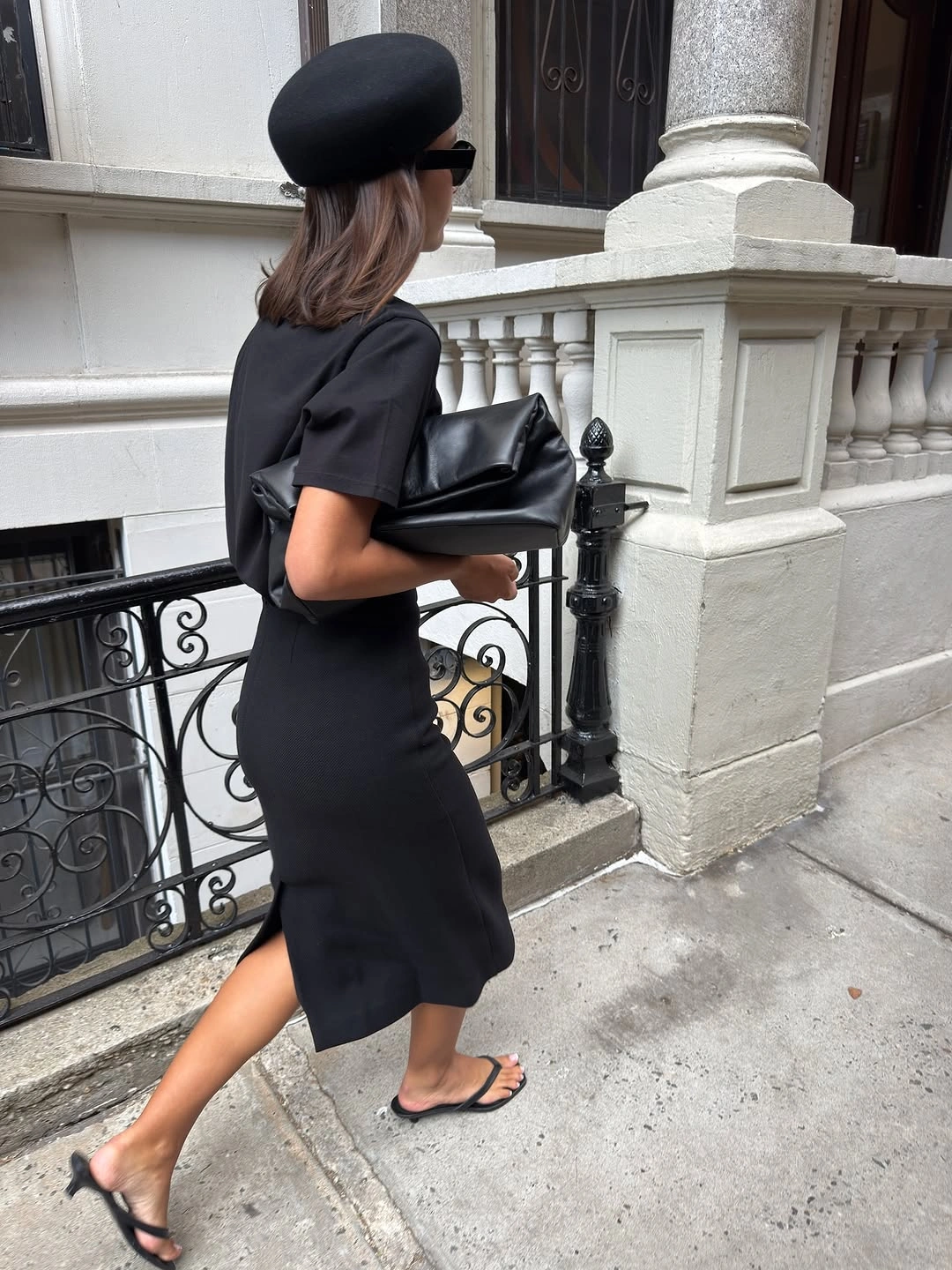 September fashion trends 2026 Black Midi Dress With Sculptural Hat