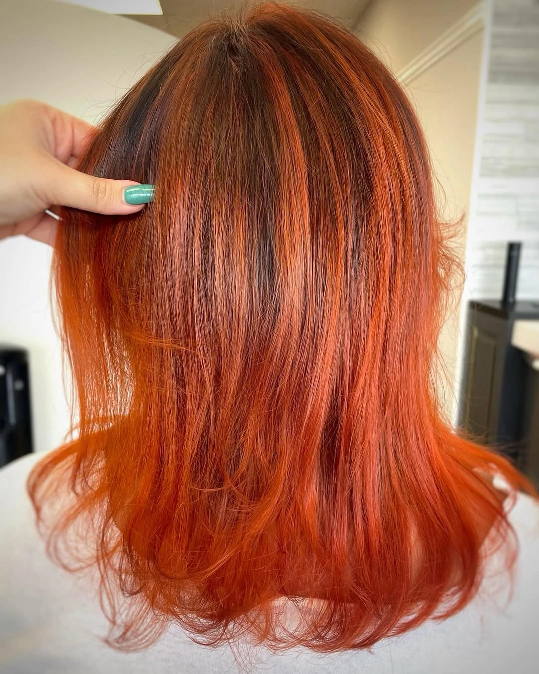 September hairstyles ideas 2026 Bright Copper Long Bob With Wispy Ends