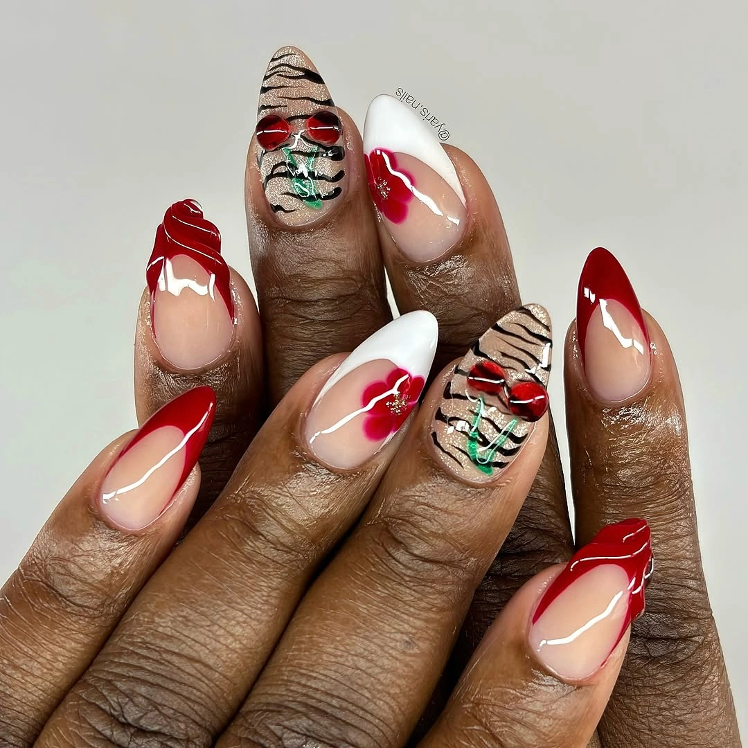September nail art ideas 2026 Red French Nails With Zebra And Floral Accents
