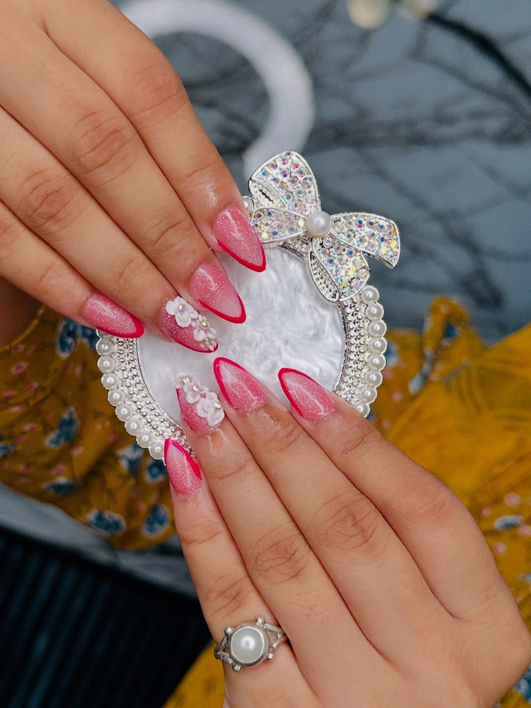 September nail art ideas 2026 Hot Pink Tips With White Floral Texture
