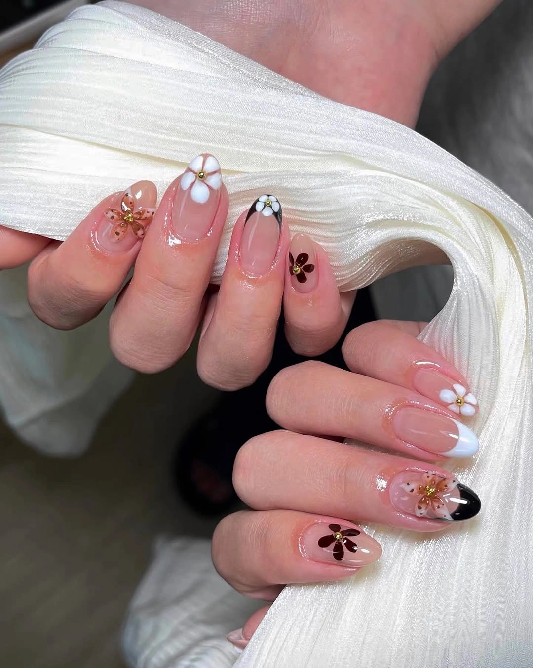 September nail art ideas 2026 Blush Nails With Black And White Daisies