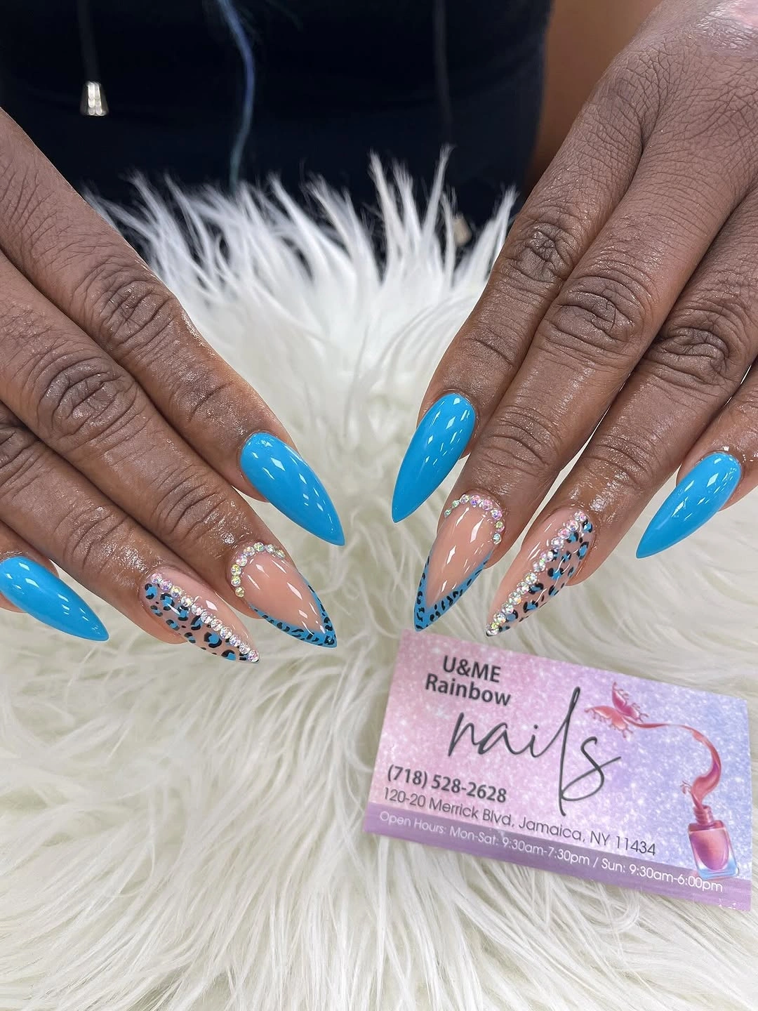 September nail art ideas 2026 Bright Blue Almond Nails With Confetti Accent