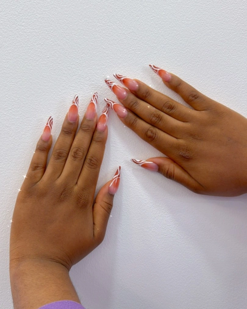 September nail art ideas 2026 Long Almond Nails With Copper Swirls