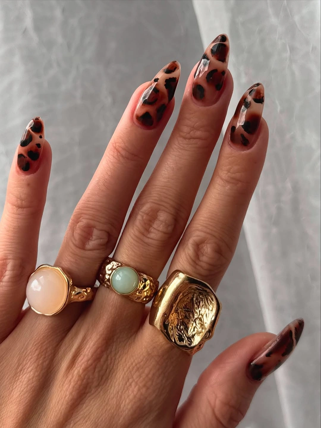 September nail designs 2026 Soft Tortoise Almond Nails