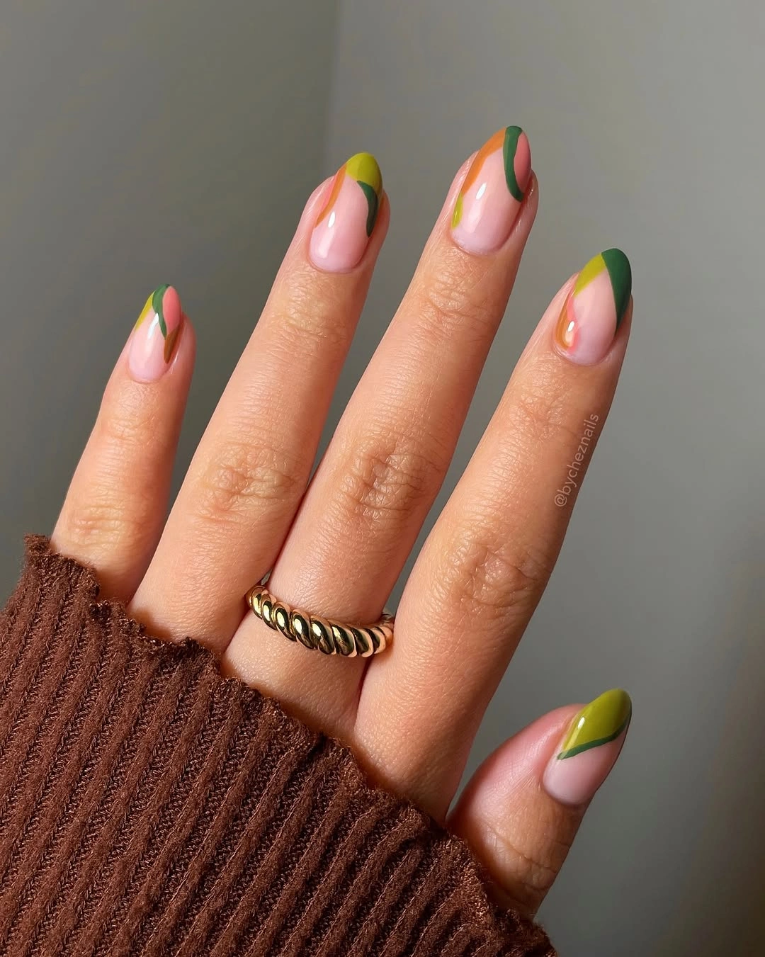 September nail designs 2026 Olive French Tips With Orange Curves