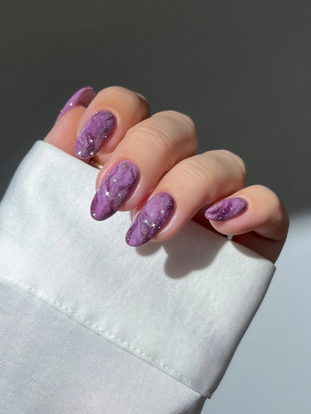 September nail designs 2026 Purple Marble Almond Nails