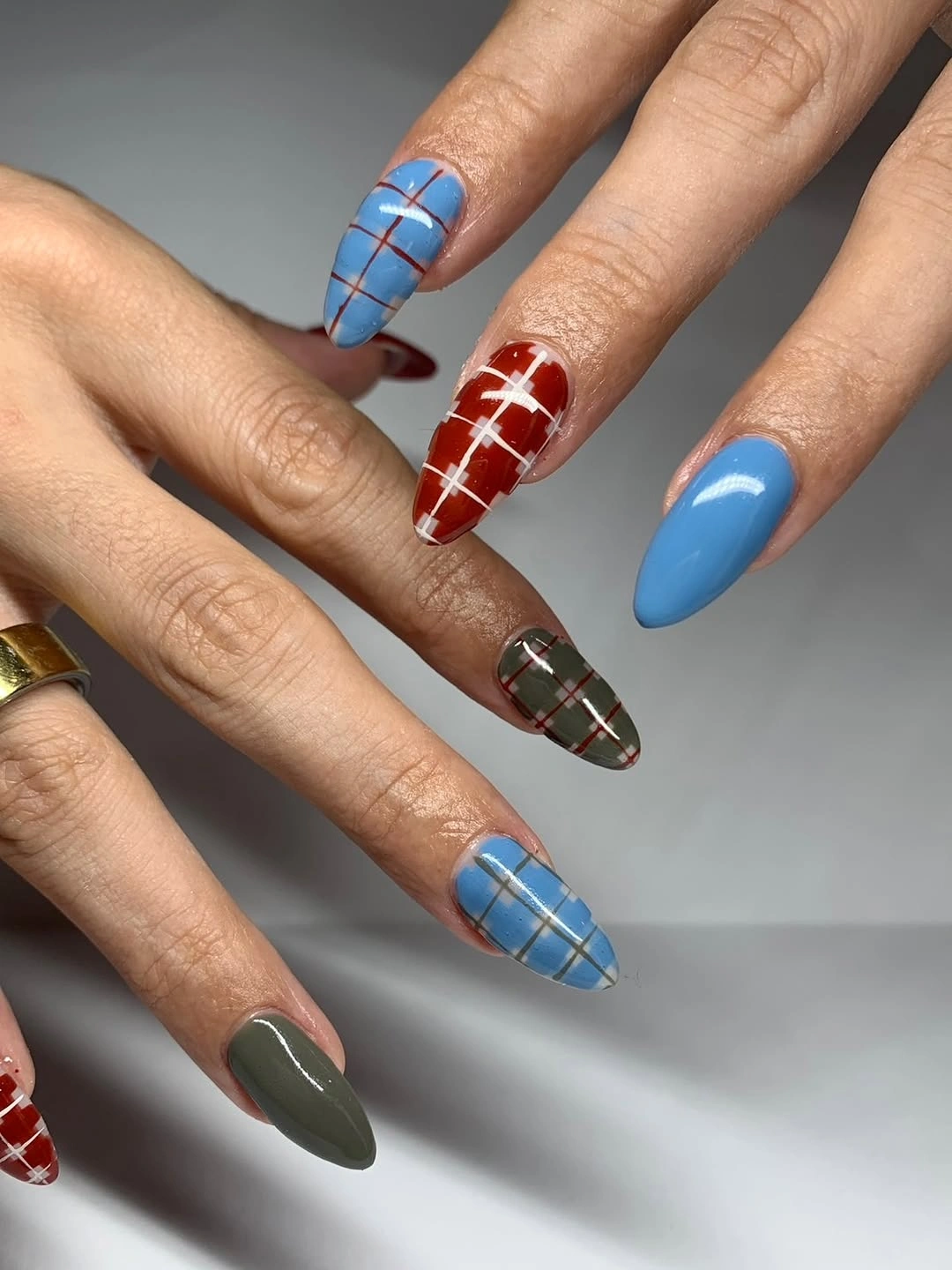 September nail designs 2026 Blue And Red Plaid Accent Nails