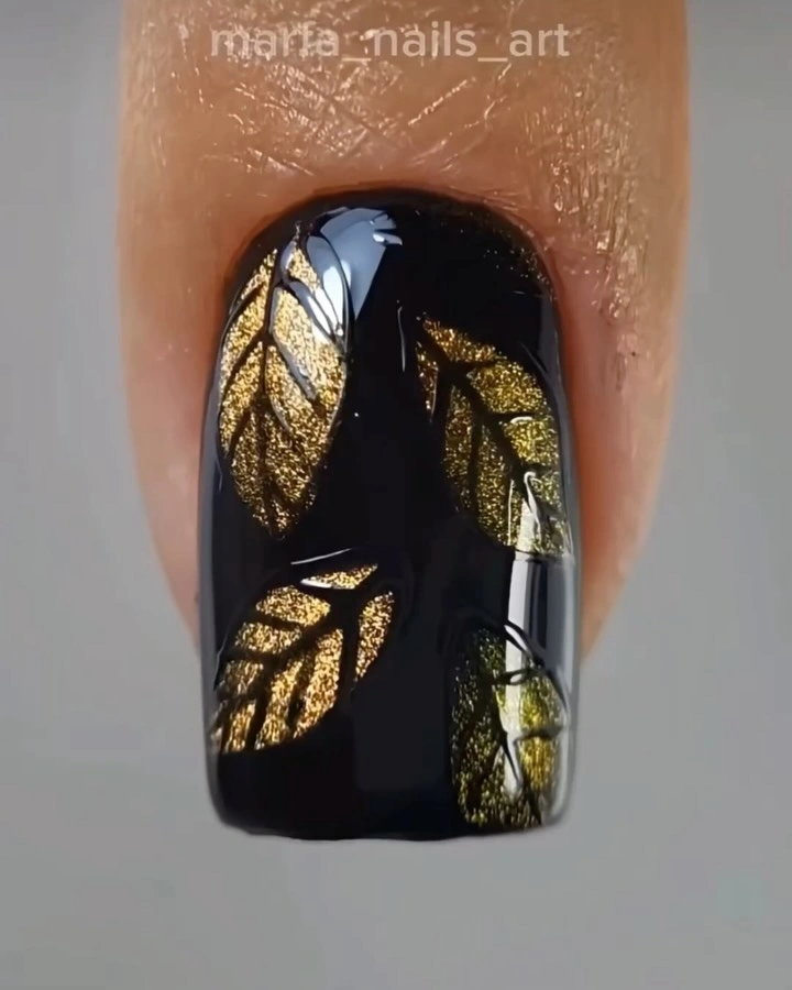 September nails color 2026 Black Nail With Metallic Gold Leaves