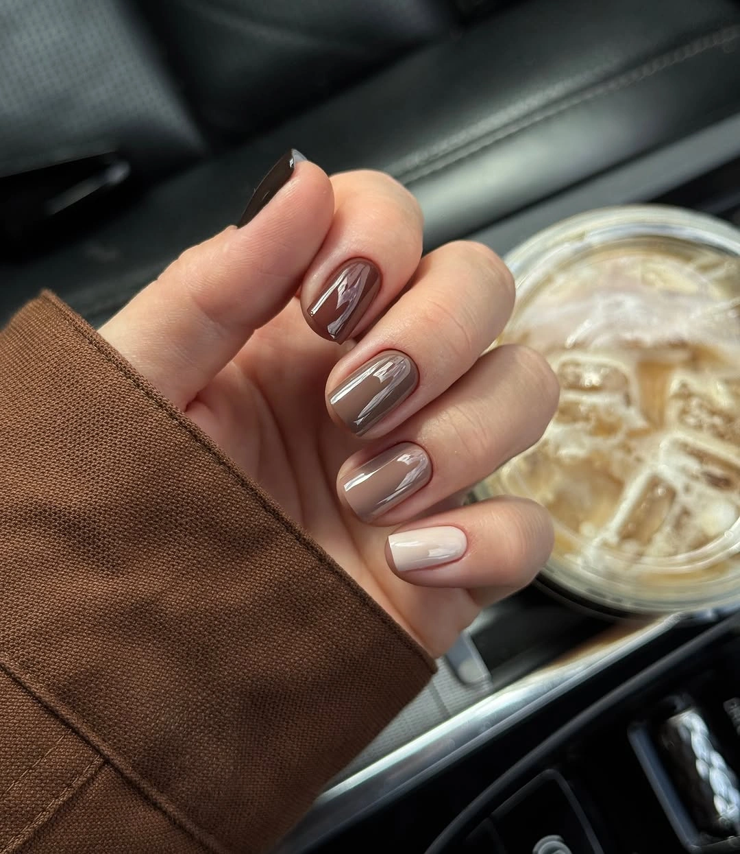 September nails color 2026 Taupe Brown Nails With Soft Marble Accent