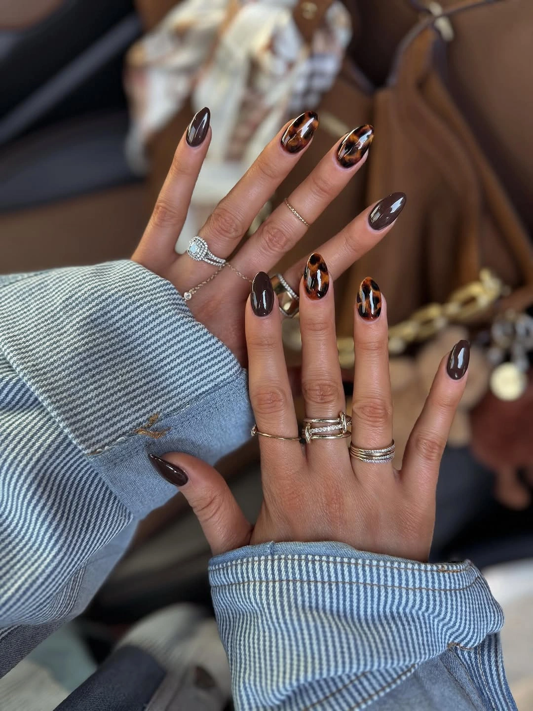 September nails color 2026 Glossy Black And Amber Tortoise Mix