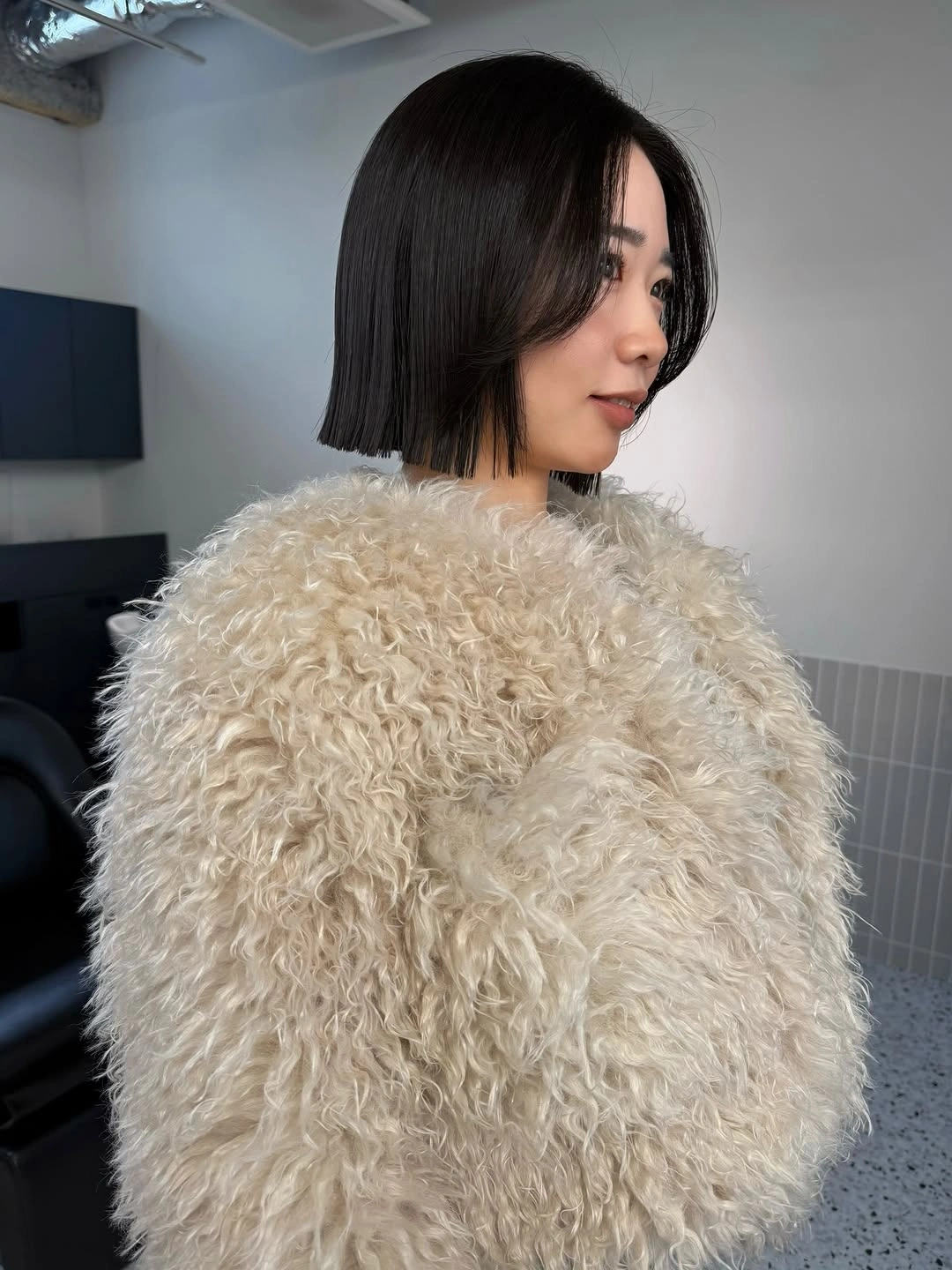 shaggy jacket Cream Close-Up Texture With A Short Bob