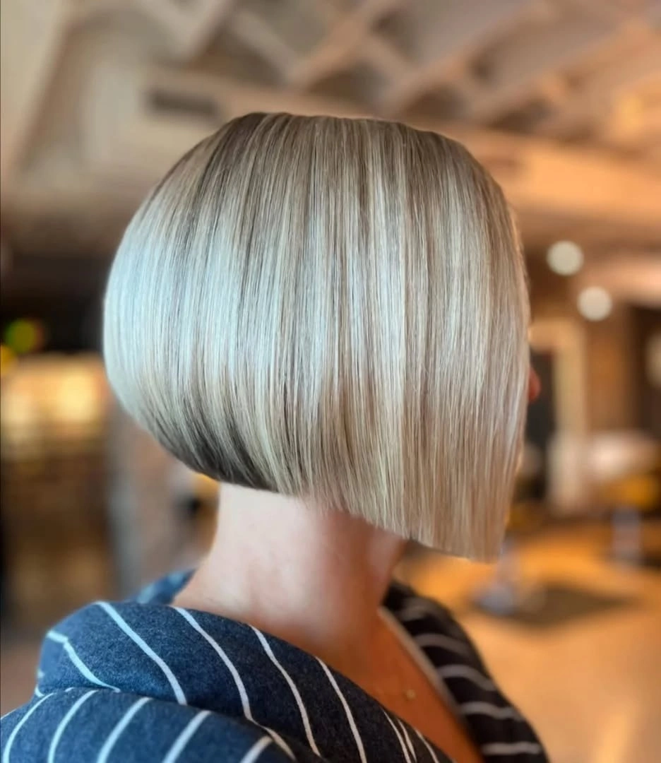 short bobbed hairstyle Precision Blonde Bob with a Sculpted Finish