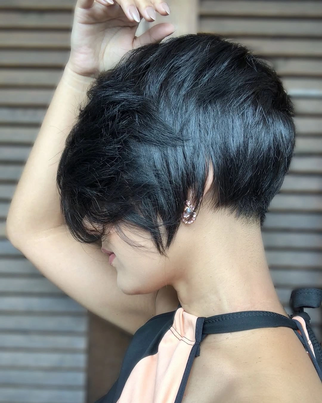 short bobbed hairstyle Classic Dark Pixie Bob with Long Side Bangs