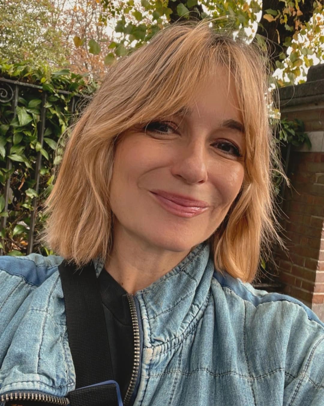 short bobbed hairstyle Soft Curtain Bangs That Make a Classic Bob Feel Effortless