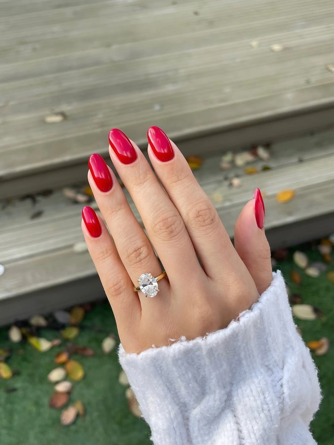 medium almond nails with vivid red French tips