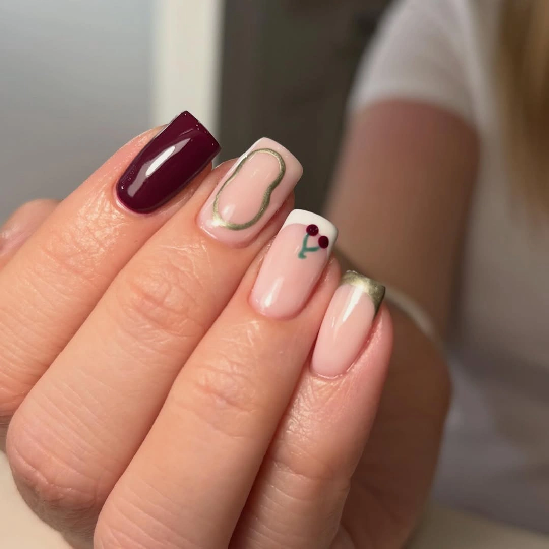 medium square pink French nails with burgundy accent