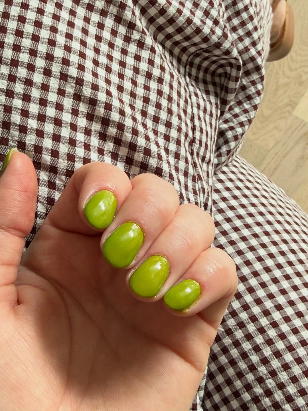 short rounded nails in vivid lime green gloss