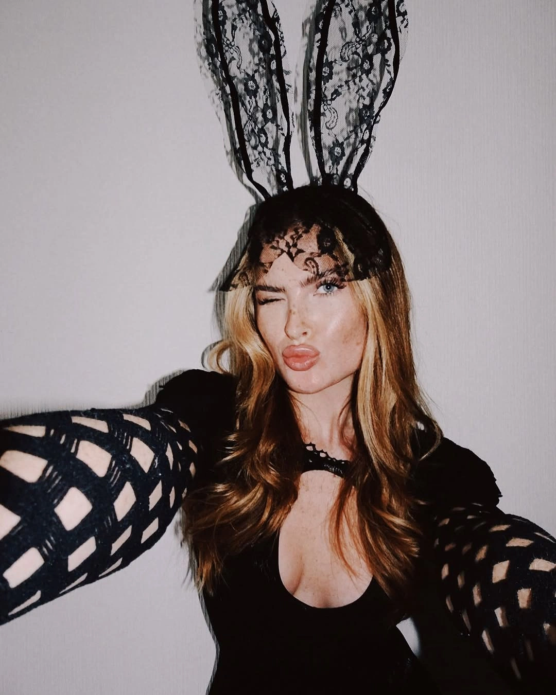 Black open-knit top with lace bunny ears and choker