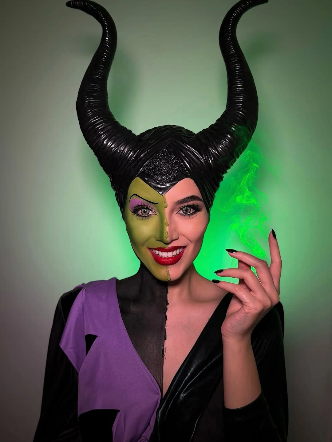 Black horned costume with purple and black split-color top