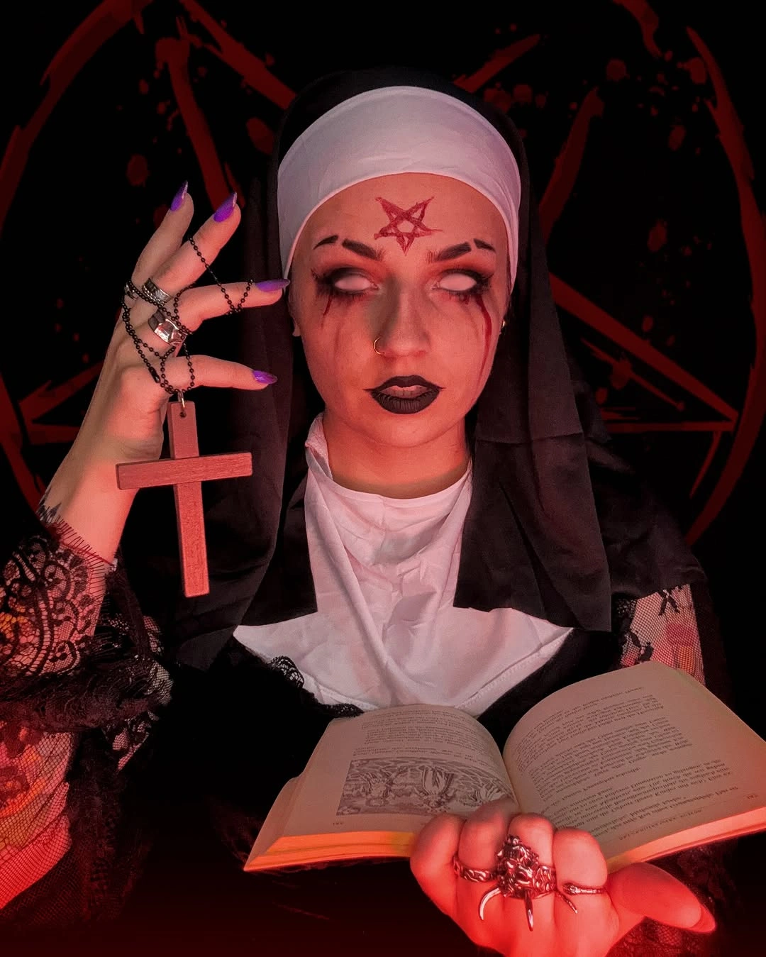 Dark nun-inspired costume with white head covering and red cross