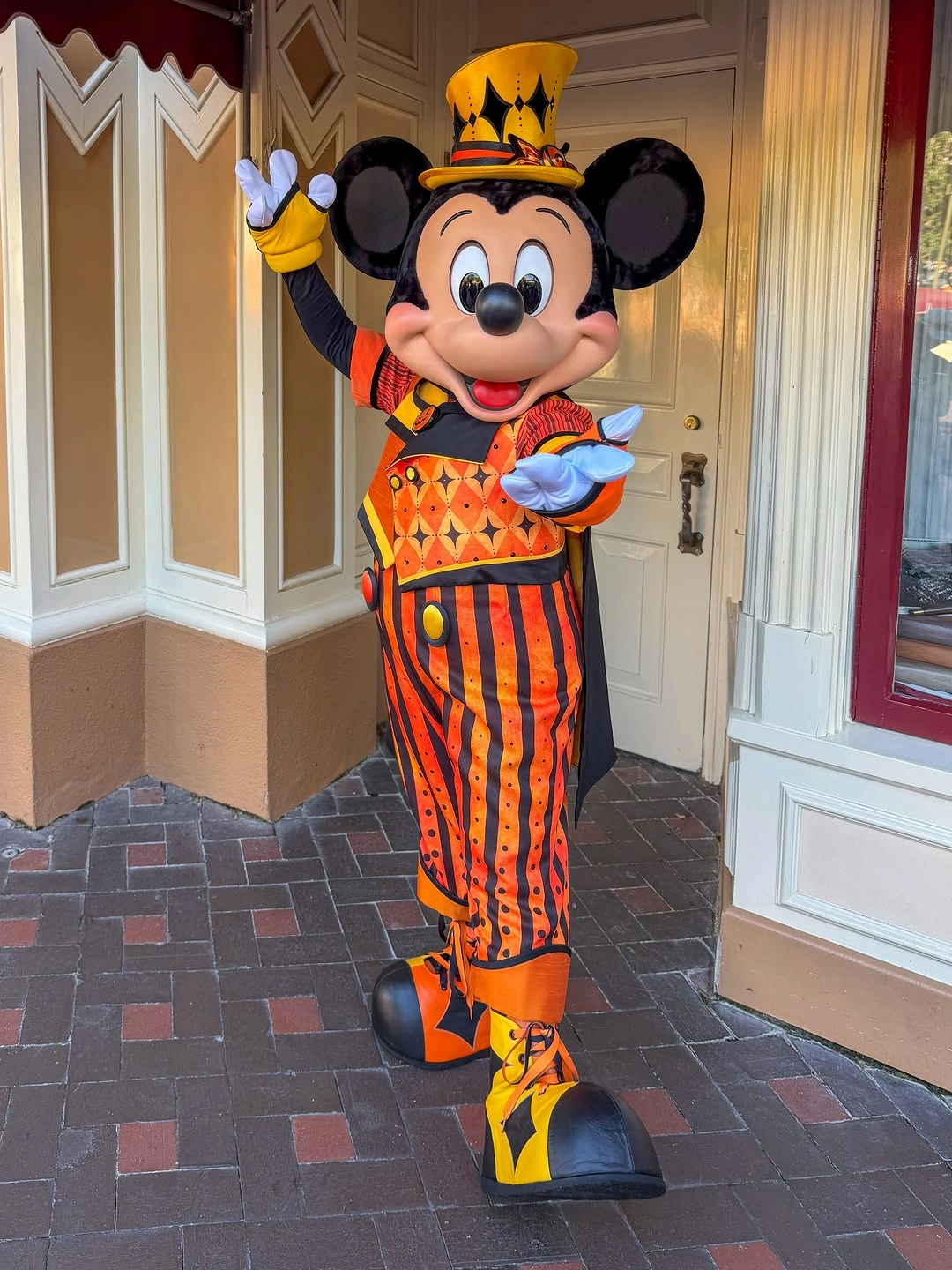 Orange and black striped character costume with round-ear headpiece